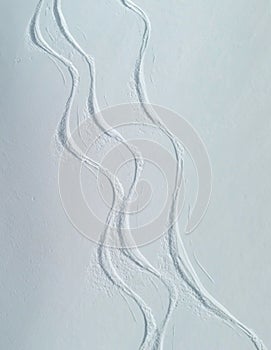 Ski tracks on snowy slope