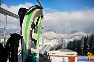 Ski in winter season, mountains and ski touring equipments on the top in sunny day