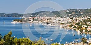 Skiathos island Greece port harbor city town panoramic view banner landscape Mediterranean Sea travel