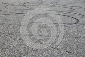 Skid marks-close up- I.C.B.C or police message for drunk driver warning for police stops