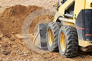 Skid steer loader works photo