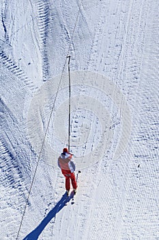 Skier ascend the slope