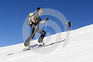 Skier ascending to the top