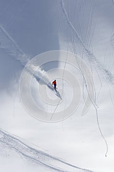 Skier in deep powder, extreme freeride