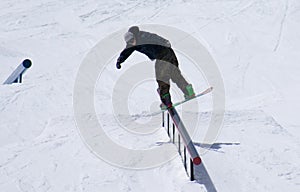 Skier doing a trick in the terain park
