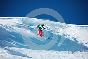 Skier downhill backcountry ski freeride photo