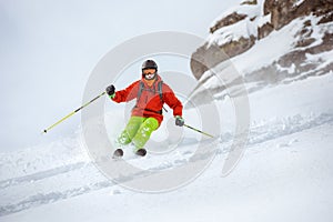 Skier freerides at offpiste slope photo