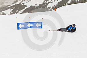 Skier having fun on top of the mountain. Playing with skis