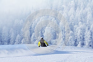 Skier in high mountains