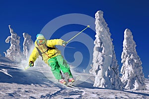 Skier in high mountains