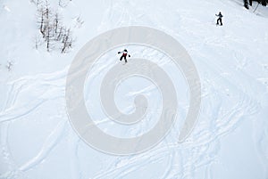 Skier makes his tracks in the deep powder snow