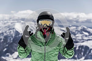 Skier in mask enjoying winter vacation