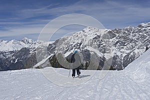 Skier at mounties hight at sunny day