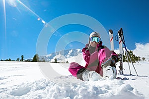 Skier resting on the ski slope