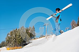 Skier resting on top of the mountain