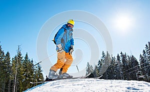 Skier resting on top of the mountain