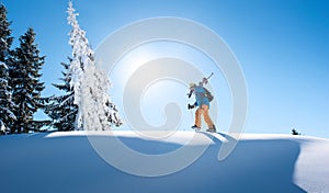 Skier resting on top of the mountain