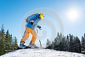 Skier resting on top of the mountain