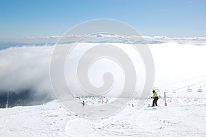 Skier rides on a slope in Strbske Pleso ski resort