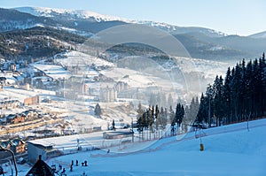 Skier riding in the mountains on a sunny winter day