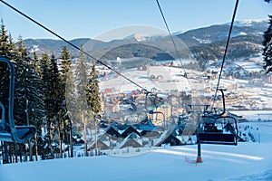 Skier riding in the mountains on a sunny winter day