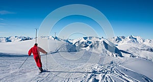 Skier on ski slope photo