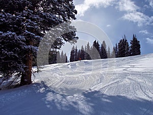 A skier on a ski slope in Colorado