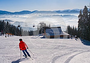 A skier on ski slope on Kubinska Hola ski restort during winter