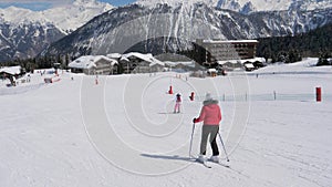 Skier Skiing Carving Style In The Mountains On The Slope Background The Chalet