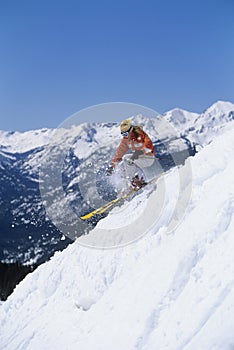 Skier Skiing Down Ski Slope