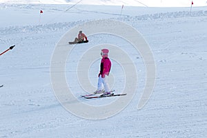 Skier skiing downhill in high mountains Ski slopes and Ski lifts.