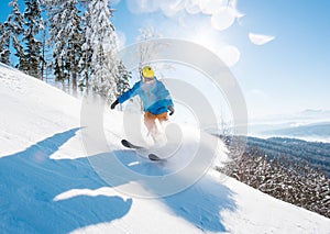 Skier skiing in the mountains