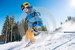 Skier skiing in the mountains