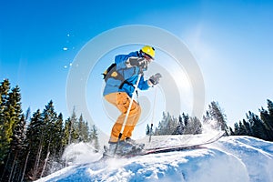 Skier skiing in the mountains