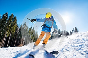 Skier skiing in the mountains photo