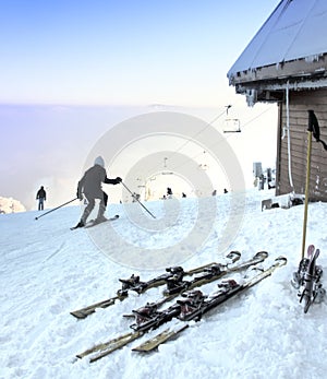 Skier and skis on a ski slope