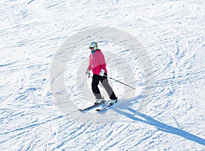 Skier on a slope enjoy fresh snow