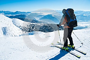 Skier on snowy mountain