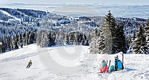 Skiers admiring the view of mountain in Kopaonik winter ski resort  Serbia