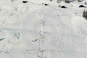 Skiers from below during Christmas holidays