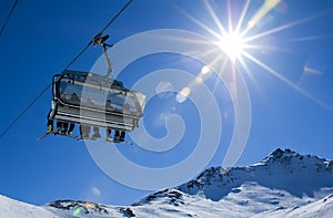 Skiers in a chairlift