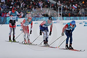 Skiers compete at mass start in the Men`s 15km + 15km Skiathlon at the 2018 Winter Olympic Games