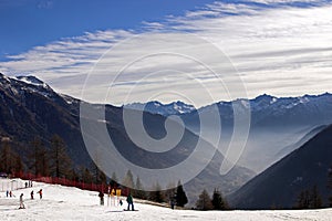 Skiers in Dolomite Mountains