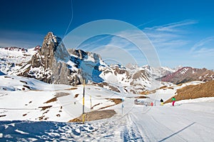 Skiers downhill skiing