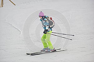 Skiers with Eiger north face behind, In winter. Kleine Scheidegg, Bernese Oberland, Switzerland