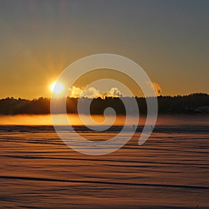 Skiers on the ice on the Lule river