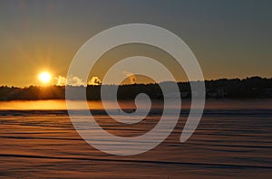 Skiers on the ice on the Lule river