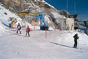 Skiers leaving a Chairlift in Cortina d` Ampezzo