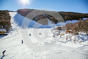 Skiers on mountain