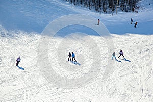 Skiers on mountain